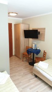 U Musa tv na ramieniu